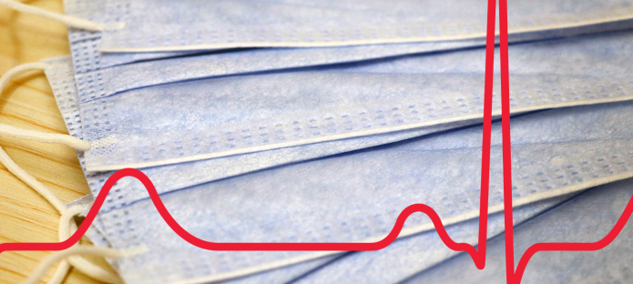 An EGC of a normal heart beat runs across a generic image of face masks